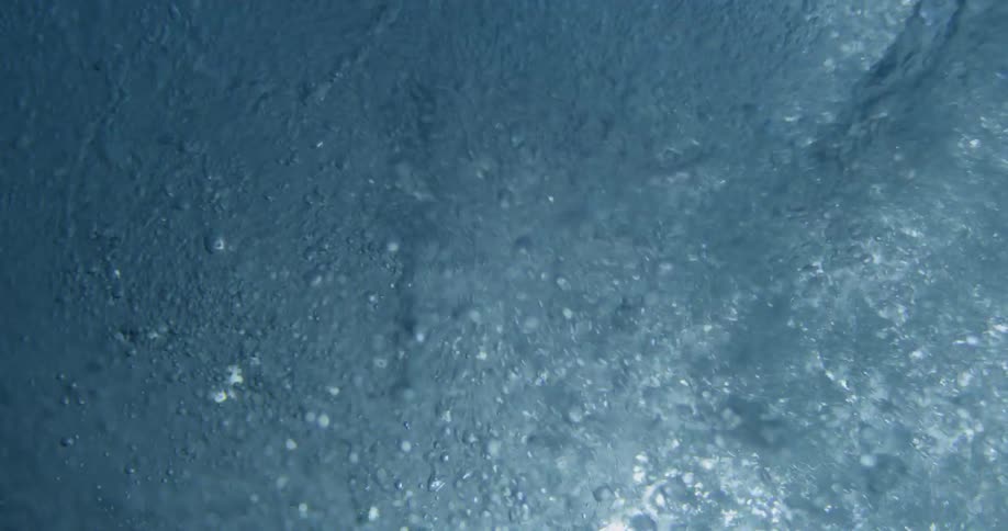 Air bubbles flowing in water