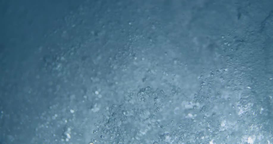 Bubbles and waves under water