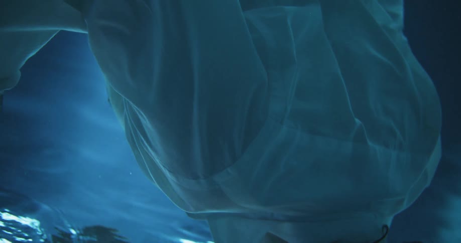 A man floating underwater