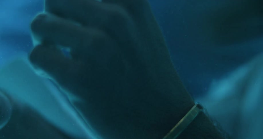 Hands moving under water