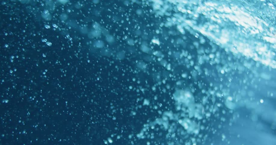 Bubbles rising to the surface on a great body of water