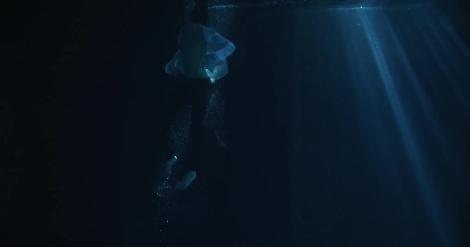 Man Floating Underwater