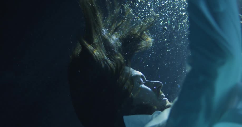 Man Floating Underwater