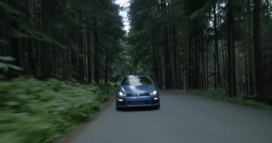 A car is driving on a road