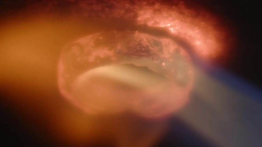 Metal ring gets heated by flame and turns red