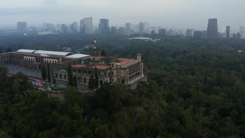 Trees surround a building in a city