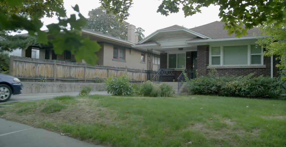 A car pulling into a house
