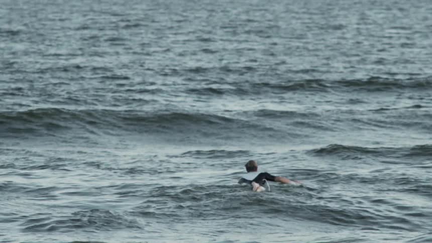 A person swimming in water
