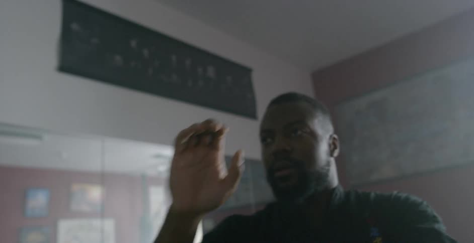 Man practices martial arts in a studio