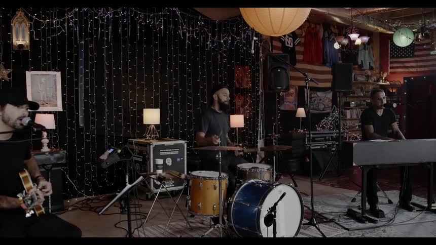 A band is performing on the small stage