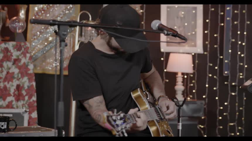 A man playing a guitar