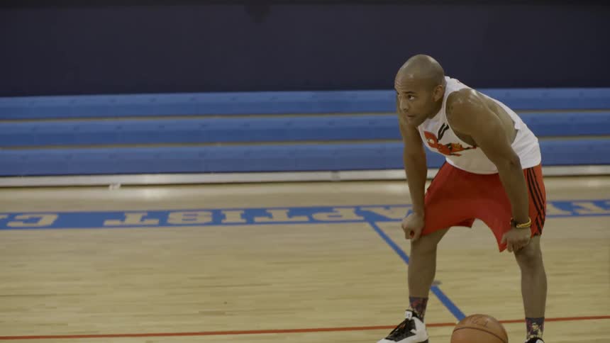 A person standing in a gym