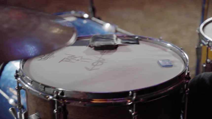 Man playing on a drum set