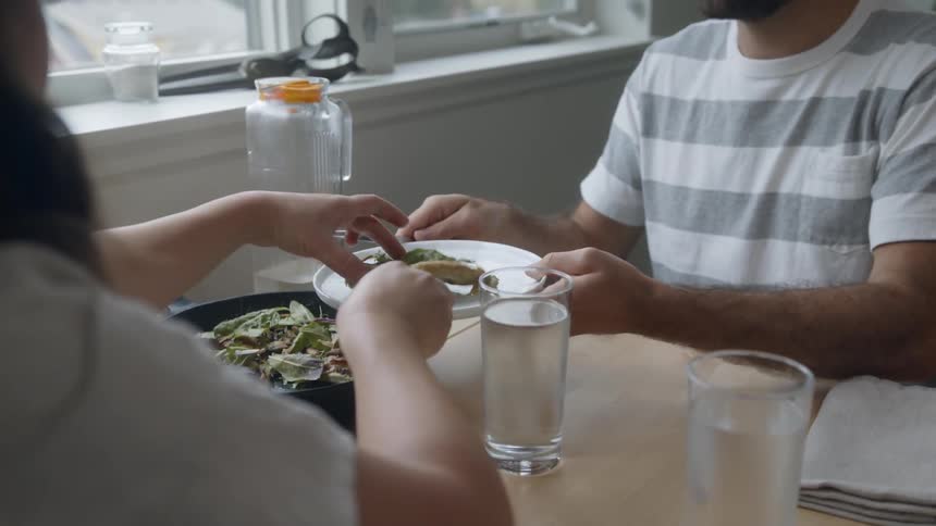 Two people share a meal together