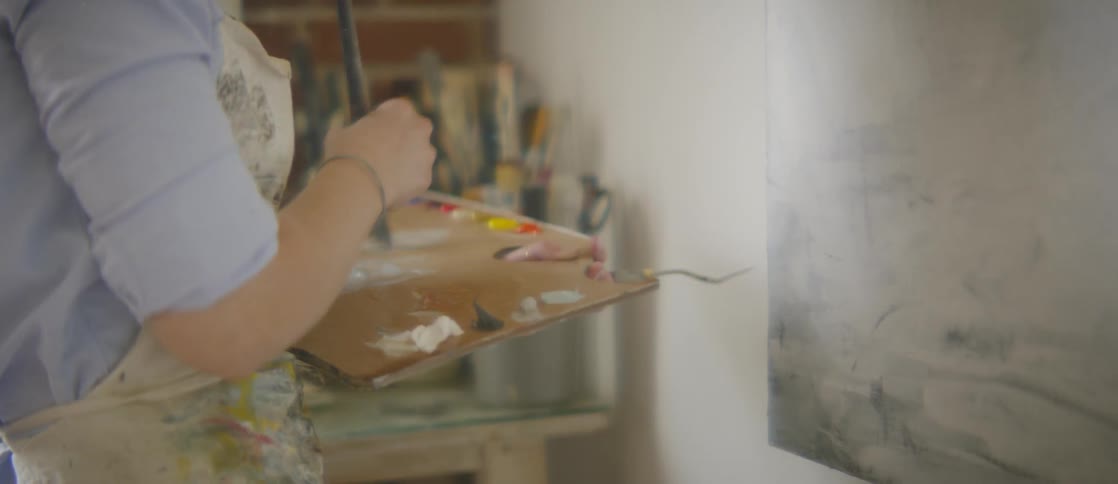 Girl Painting In Art Studio