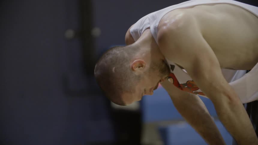 A person standing in a gym