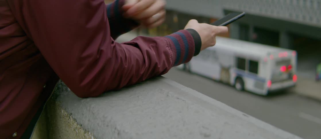 A man is outside looking around