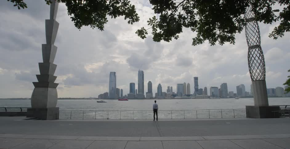 Man Looking Out At Skyline