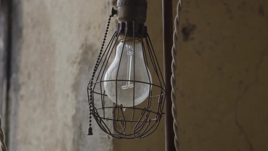 A light hangs on a wall