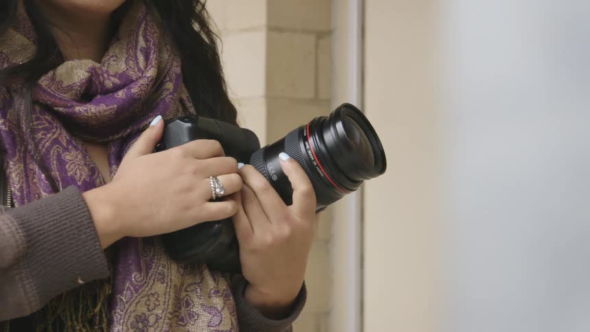 A person holding a camera