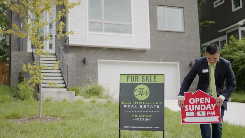 Realtor Showing Couple House