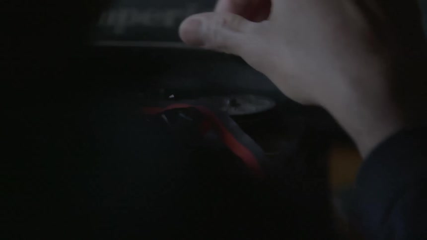 A person messing with a ribbon
