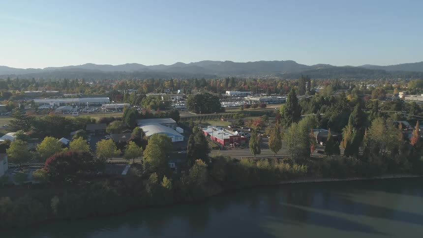 Trees turning fall colors in a small town
