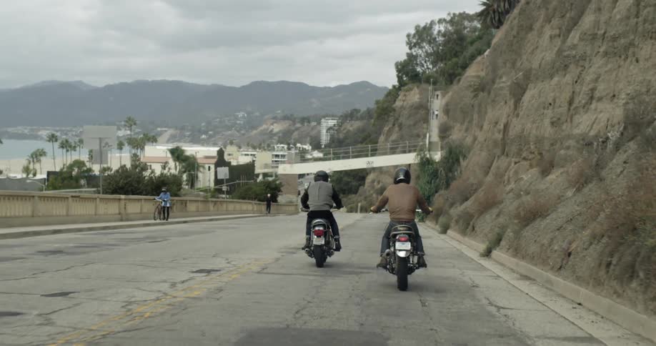 People riding motorcycles
