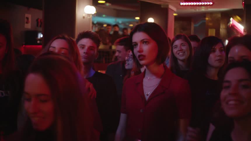 People gather together in a club dancing