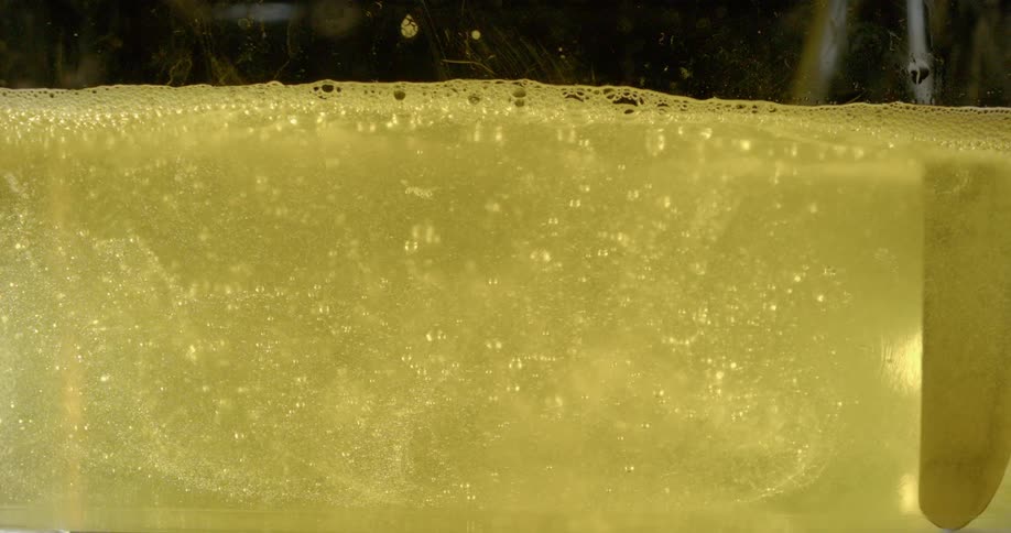 Liquid is poured into a container