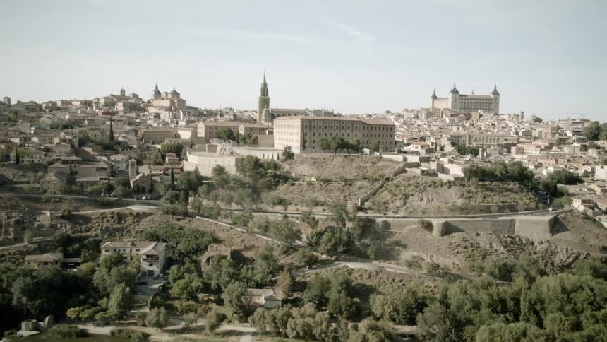 The hills are covered with buildings and homes