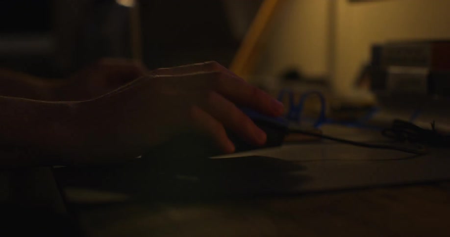 A person is using a computer indoors