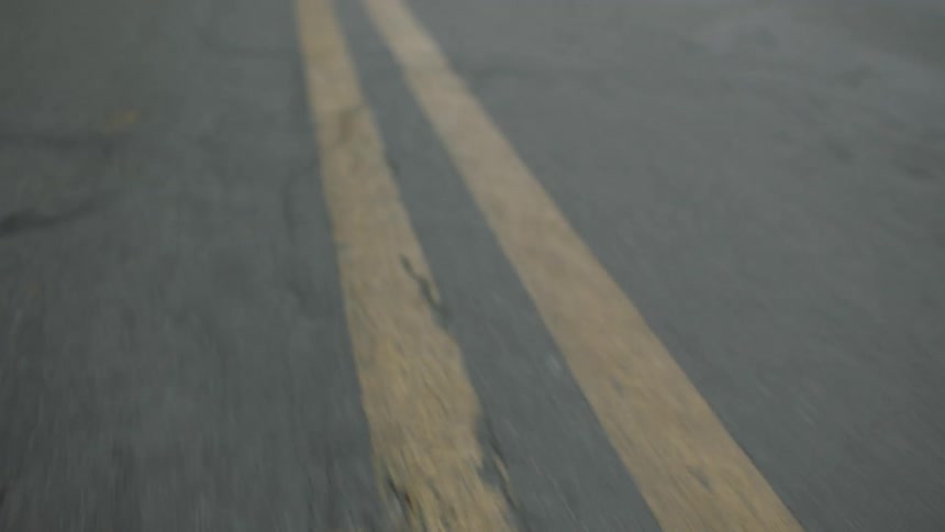 A double yellow line on a road