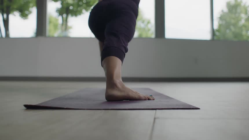A woman is doing yoga
