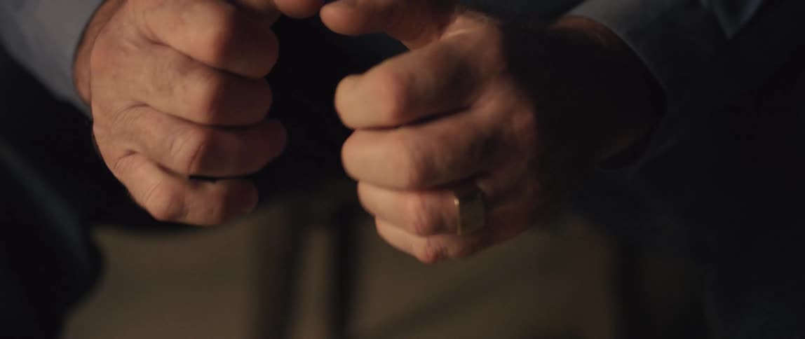 A man closing his hands