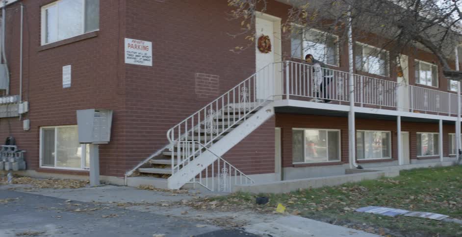 A man skateboarding down stairs