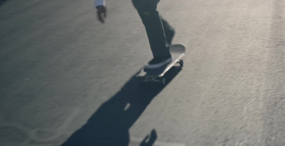 Skateboarder performs a kickflip