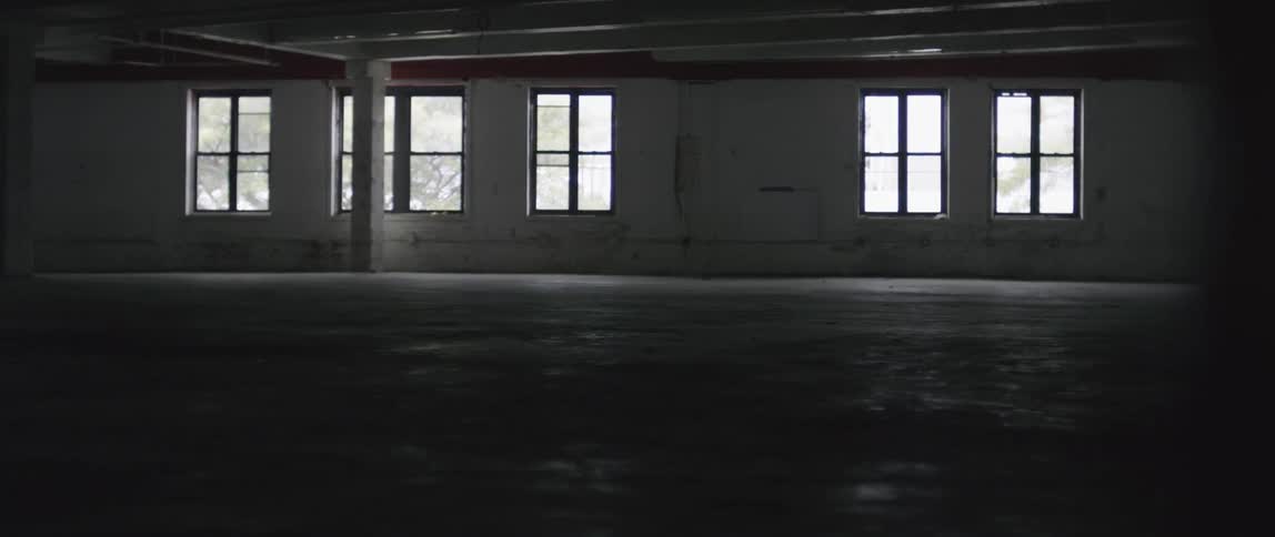 An empty warehouse during daylight