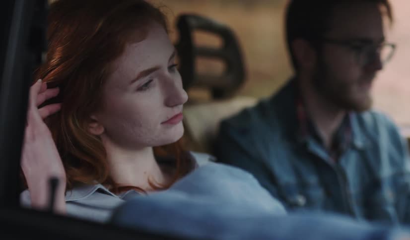Man And Woman Talking In Car