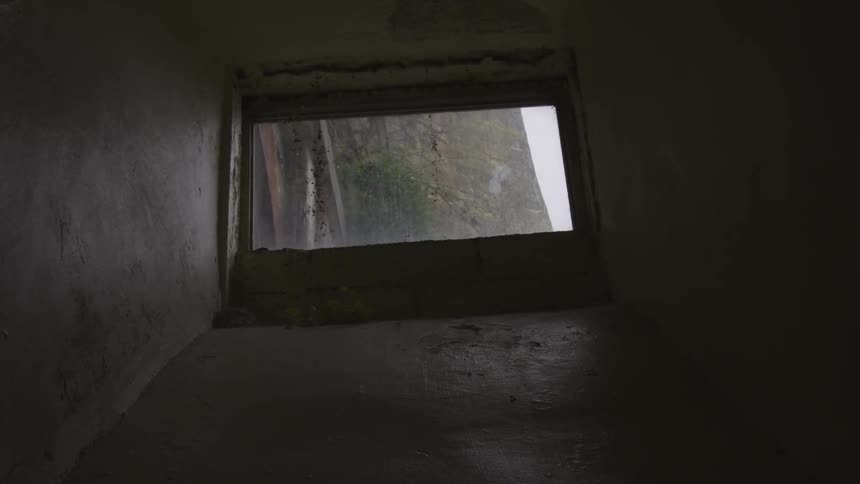 The light is shining in the small window