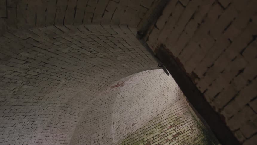 A painted brick archway