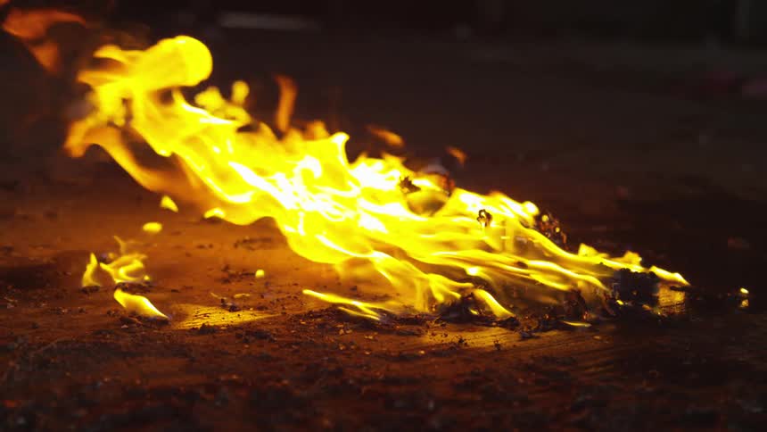 Abstract People Burning Various Objects In Warehouse