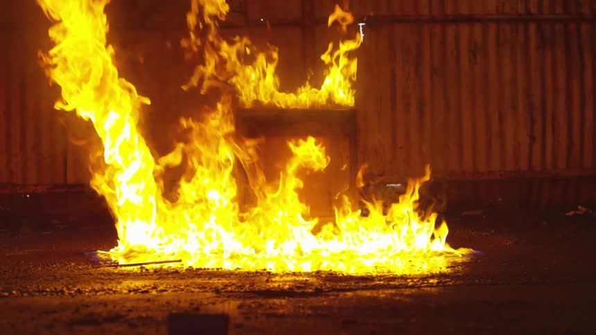 A fire is starting outdoors