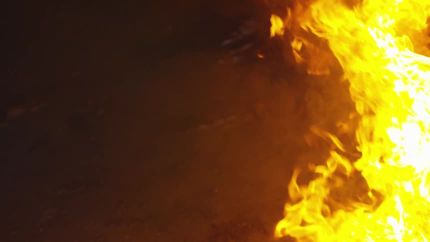 Abstract People Burning Various Objects In Warehouse
