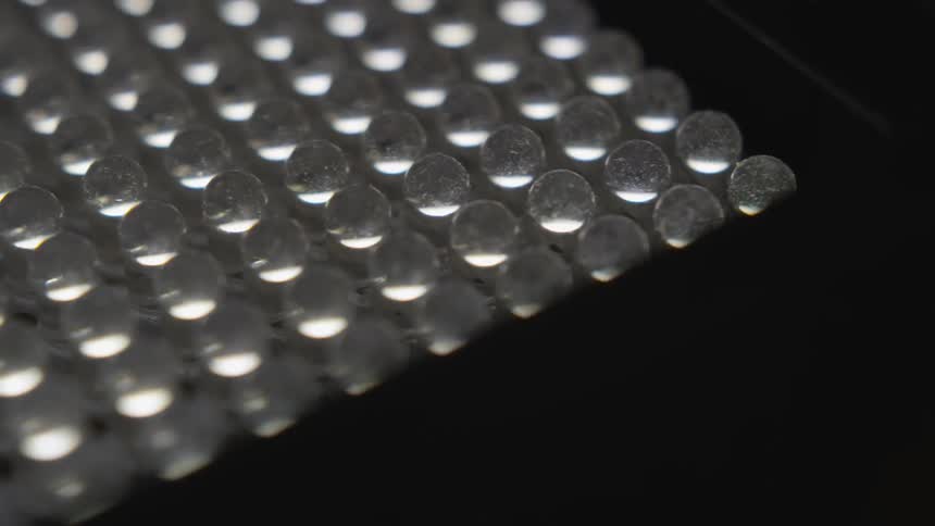 Hundreds of bubbles in a grid move by