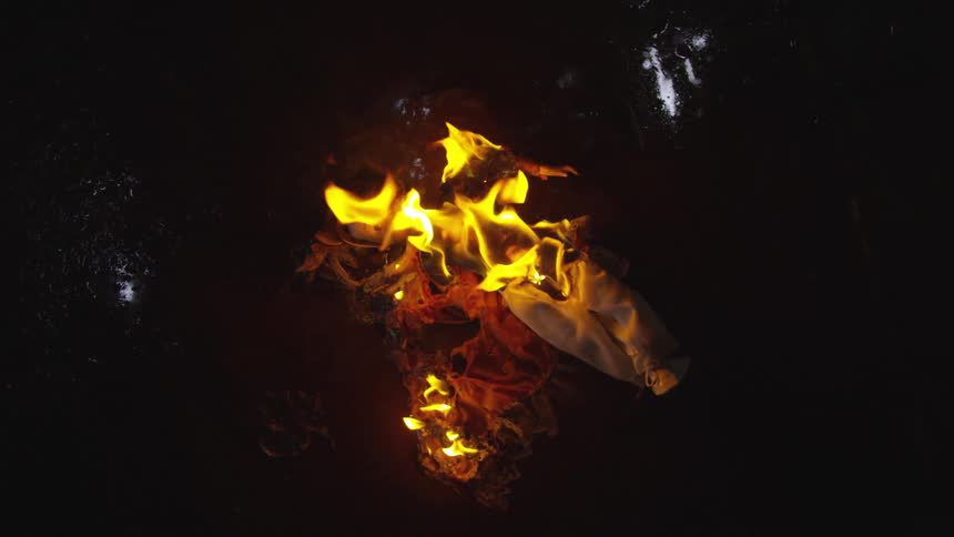 A fire rapidly consumes something