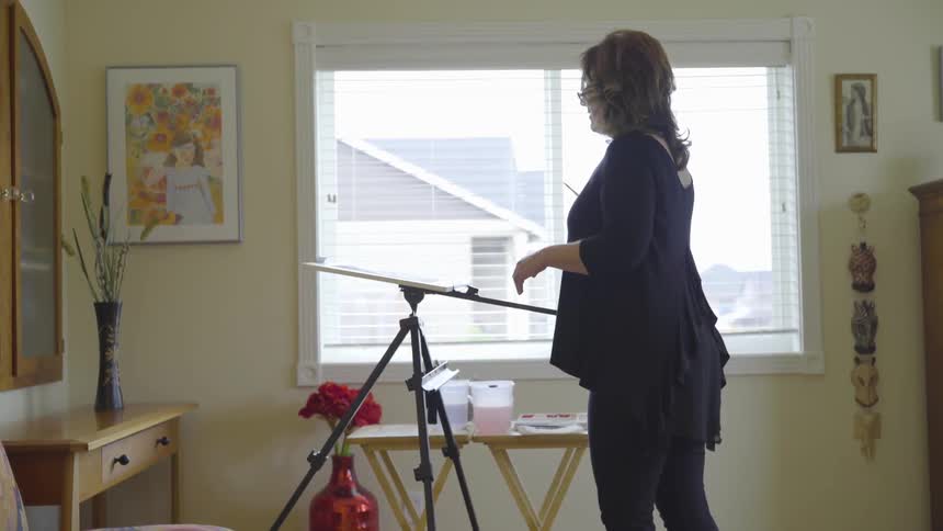 Artist Painting On Canvas