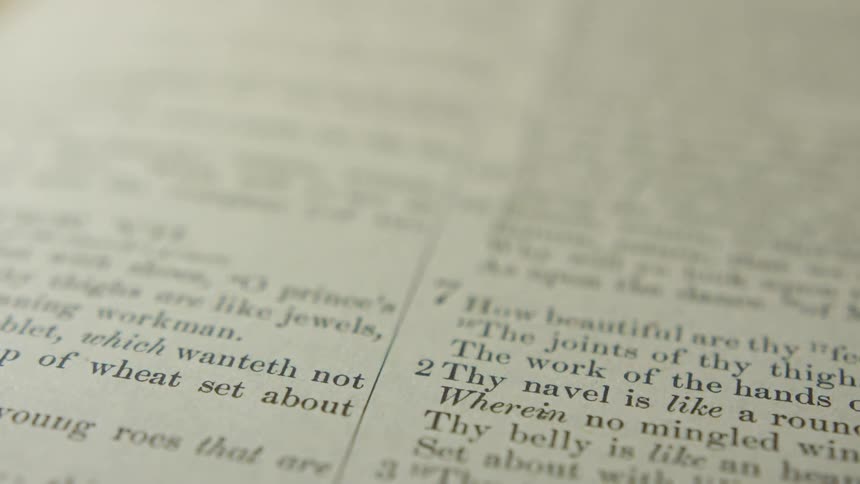 A light shines on scriptures