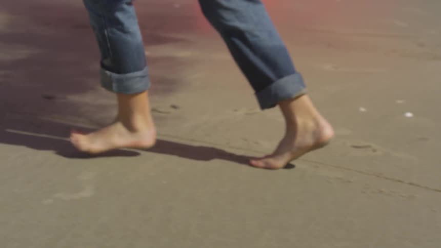 Boy Running On The Beach