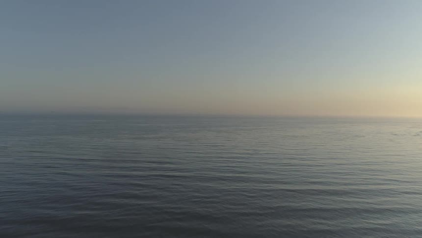 Calm ocean during sunrise